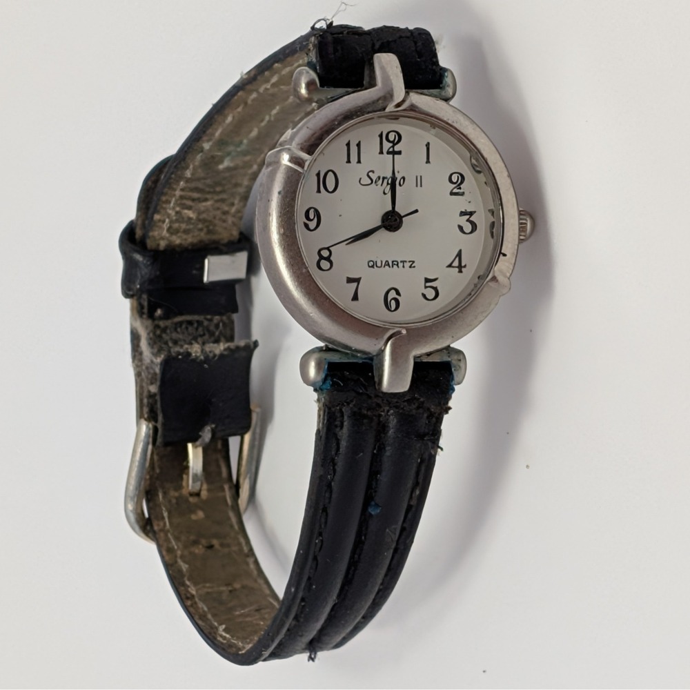 Sergio II Womens White Dial Analog Quartz Watch Black Leather Band 8" Untested